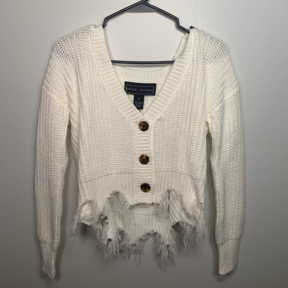 Long sleeve sweater like crop top.